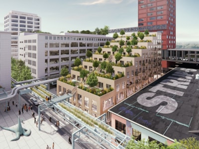 Tribune-shaped building provides affordable housing and interconnected green spaces for residents next to Eindhoven's cultural heart